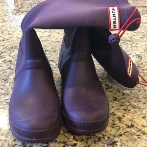 Hunter boots with rubber bottoms and fabric tops